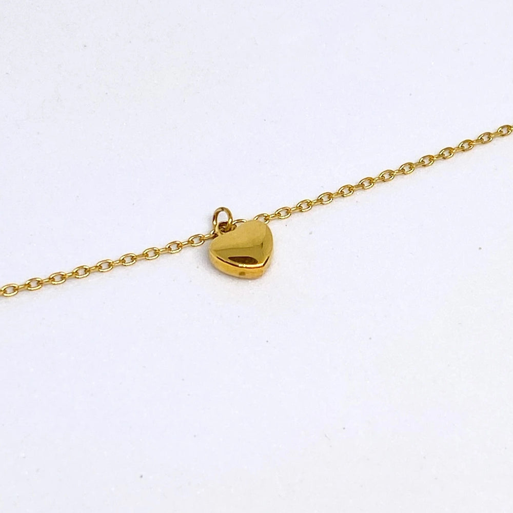 
                      
                        Heart Charm Bracelet
                      
                    