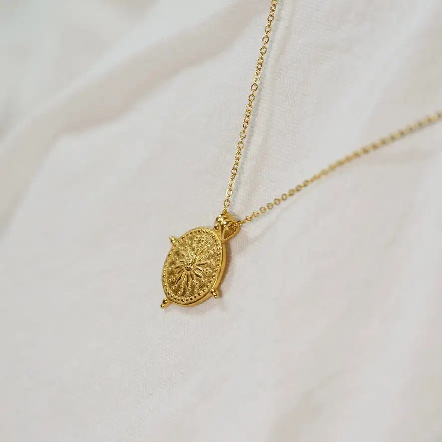 
                      
                        Sun Disk Pendant Necklace
                      
                    