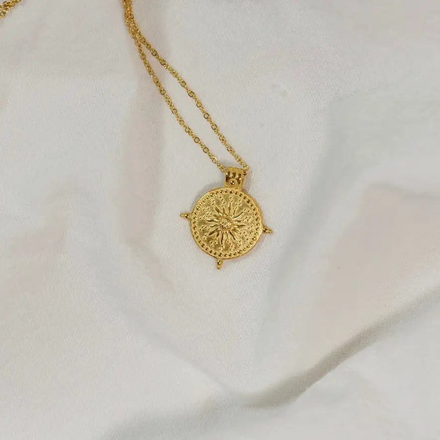
                      
                        Sun Disk Pendant Necklace
                      
                    