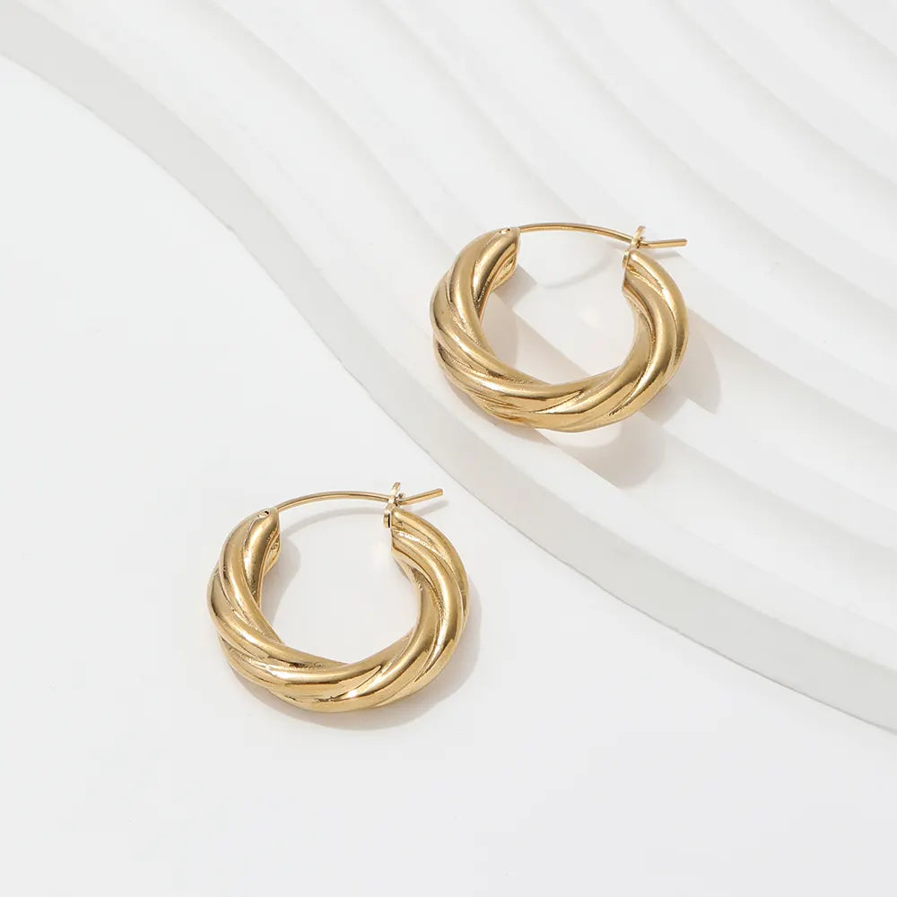 
                      
                        Simple Twist Huggie Earrings
                      
                    